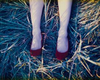 2174 Melanie Pullen (b. 1975) "Anna and the Grass," from the "High Fashion Crime Scenes" series, 2003 C-Print in colors on paper Edition: 5/15 Signed, titled, and numbered verso, confirmed by the artist and based on a photograph affixed to the frame's backing paper; titled by the artist Sight: 19 1/2 x 29 3/4 in. Estimate: $2,000 - $4,000