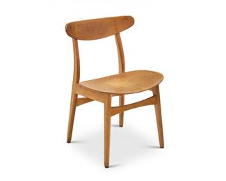 2245 Hans Wegner (1914-2007) A CH30 dining chair for Carl Hansen & Son, mid-20th century Designed 1954 With molded seatback and seat, which is without cushion Unmarked Height 30 1/4 in., width 20 in., depth 18 1/2 in. Estimate: $600 - $800