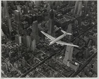 2330 Margaret Bourke-White (1904-1971) "A DC-4 Flying over New York City," 1939 Gelatin silver print on paper Edition: 70/250, a later impression, printed 1997 Embossed signature in the lower margin, at right: Margaret Bourke-White; numbered in ink in the lower margin; stamped in tan ink on the verso: "Limited Edition Print Issued by: / Life Gallery of Photography/ in association with the / Estate of Margaret Bourke-White"; annotated with the title, date, and "Print made in the Time Life photo lab, 1997," and "© Time Inc./All Rights Reserved," all in pencil by an unknown hand along the verso of the margin edges; Time Life, New York, NY, prntr. and pub. Image: 16 1/4 x 20 1/4 in.; Sheet: 20 1/4 x 24 1/8 in. Estimate: $6,000 - $8,000