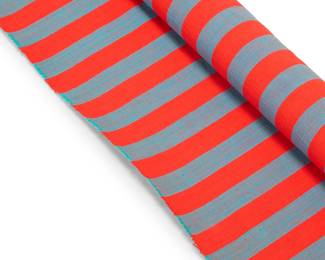 2242 Attributed to Alexander Girard (1907-1993) A rolled length of 'Mexicottons'-style striped furnishing fabric Possibly for Herman Miller, designed 1961, no. 1229 Woven lengthwise stripes of red and blue, likely cotton Unmarked Width 53 1/2 in., length 2 1/2 yds.; rolled diameter 2 3/4 in. approximately Estimate: $500 - $700