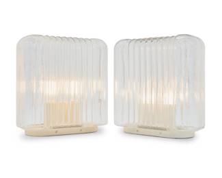 2167 Angelo Mangiarotti (1921-2012) A pair of 'Lari' table lamps for Karakter, late 20th century Designed 1978 The two-light lamps each with hand-blown glass shade and painted metal base, electrified Each appears unmarked 2 pieces Height of each overall 15 in., width 13 3/4 in., depth 6 7/8 in. Estimate: $700 - $900