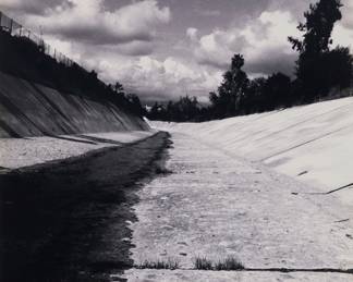 2172 Melanie Pullen (b. 1975) "LA River," from the "High Fashion Crime Scenes" series, 2003 C-Print on paper Edition: 1/10 Signed, dated and numbered with "©" verso, confirmed by the artist and based on a photograph affixed to the frame's backing paper; titled by the artist and on the sales invoice Sight: 41 x 28 1/4 in. Estimate: $2,000 - $4,000