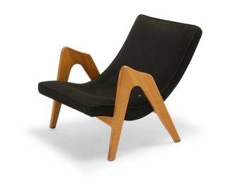 2010 Adrian Pearsall (1925-2011) A '705-CW' lounge chair for Craft Associates, 1960s Designed 1961 With sloping back upholstered in a tufted black boucle fabric, supported on modified V-form supports Unmarked Height 30 3/4 in., width 26 1/4 in., depth 37 1/2 in. Estimate: $700 - $900