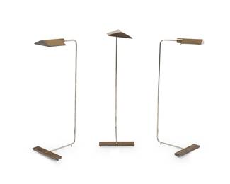2166 Cedric Hartman (b. 1929) Three brass 'Swivel' floor lamps, late 20th century The single-light lamps each with brass base issuing a rotating and extendable chromed metal tubular standard, electrified Each base with impressed factory marks and numbered: CEDRIC HARTMAN / [script signature] 3 pieces Lowest height of each 36 1/4 in., width 11 in., depth 13 1/2 in. Estimate: $1,200 - $1,800