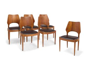 2141 Arne Hovmand-Olsen (1919-1989) A set of six dining chairs for Mogens Kold, mid-20th century With spade-form seat back above a leather upholstered seat cushion, raised on attenuated legs Each with foil label to underside: DANISH FURNITUREMAKERS CONTROL 6 pieces Height of each 34 1/2 in., width 19 1/2 in., depth 20 in. Estimate: $700 - $900