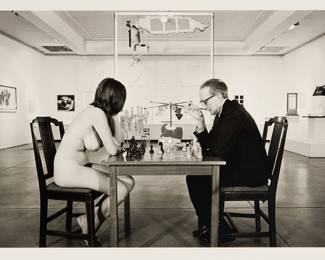 2334 Julian Wasser (b. 1938) "Marcel Duchamp Playing Chess with a Nude [Eve Babitz]," 1963 Gelatin silver print on paper From the edition of unknown size and date Signed in pencil verso: J Wasser Image: 12 x 17 1/8 in.; Sheet: 17 1/8 x 22 1/8 in. Estimate: $800 - $1,200