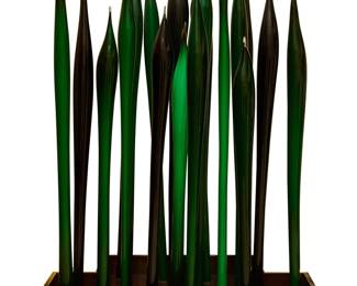 2066 A 19 Piece Art Glass Installation Late 20th/early 21st century Unsigned Multi-colored glass mounted to a custom lacquered mahogany base with rubber-tipped metal rods Height overall with base 7 ft. 9 in., width 5 ft. 10 in., depth 3 ft. 8 in.; height of tallest reed 7 ft. 9 in.; height of shortest reed: 6 ft. 1 1/2 in. Estimate: $7,000 - $9,000