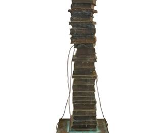 2095 Peter Shelton (b. 1951) "Books" water fountain, 1993 Cast bronze, copper tubing, subterranean water pump, electrified Appears unmarked Height of bronze 66 in., width 18 1/4 in., depth 18 1/4 in.; height with pump 4 1/2 in. Estimate: $3,000 - $5,000