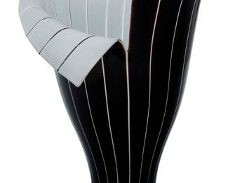 2072 Toni Zuccheri (1937-2008) A Murano glass Spacchi vase for Barovier & Toso, late 20th century Etched to underside: barovier / & toso / murano; with applied label: vetri / vm / murano / 007 Height 14 in., width 11 in., depth 10 1/4 in. Estimate: $500 - $700