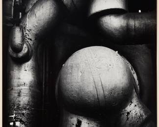 2332 Ansel Adams (1902-1984) "Pipes and Gauges, West Virginia," plate 10 from "Portfolio V," 1939 Gelatin silver print mounted to paperboard, as issued Edition: V-10 11/110, printed 1970 Signed and numbered in pencil on the lower mount: Ansel Adams; titled and numbered in ink in another hand, and with the portfolio stamp, all on the mount, verso; Parasol Press, Ltd., New York, NY, prntr. Image/Sheet: 19 5/8 x 15 5/8 in.; Mount: 28 3/4 x 22 7/8 in. Estimate: $1,000 - $1,500