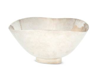 2237 A Modern hammered sterling silver center bowl Mid-20th century Impressed to underside: DEMATTEO / HAND HAMMERED / STERLING / 320 Height 5 1/2 in., width 10 1/4 in., depth 10 1/4 in. 25.8 oz. troy approximately Estimate: $1,000 - $1,500
