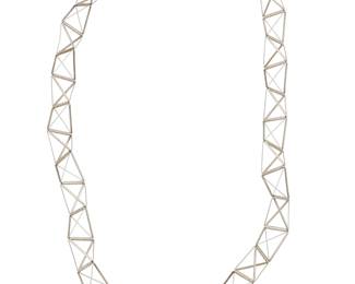 2240 Yoko Takirai (20th Century) A delicate geometric tubular sterling silver necklace, early 21st century Stamped to clasp for artist, for sterling and with marks for Florence, Italy 23 1/2 in. x 7/8 in. 19.6 grams Estimate: $300 - $500