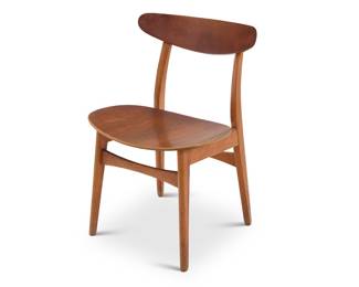 2246 Hans Wegner (1914-2007) A CH30 dining chair for Carl Hansen & Son, mid-20th century Designed 1954 With molded seatback and seat, which is without cushion Impressed: 88 Height 29 3/4 in., width 20 1/4 in., depth 19 in. Estimate: $600 - $800