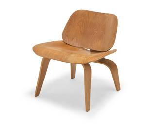 2243 Charles and Ray Eames (1907-1978 and 1912-1988) An LCW molded plywood lounge chair, 1st generation transitional, late 1940s Designed 1946 The molded veneered plywood body with round rubber shock mounts to seatback and seat, raised on two U-form legs, the underside screws in 5-2-5 formation Unmarked Height 26 1/2 in., width 22 in., depth 25 in. Estimate: $600 - $800