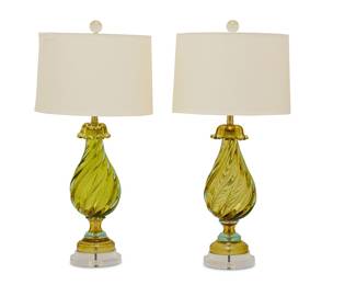 2318 A pair of Marbro glass table lamps Mid-20th century, possibly Archimede Seguso (1909-1999) The two-light lamps each on an acrylic base, with conical fabric and paper shade and glass ball finial, electrified Each numbered to factory label applied to standard: 6865 2 pieces Height of lamp base 37 3/4 in., diameter 8 1/8 in.; height of each glass 19 3/4 in.; height of shades 12 in., diameter 18 in. Estimate: $600 - $800