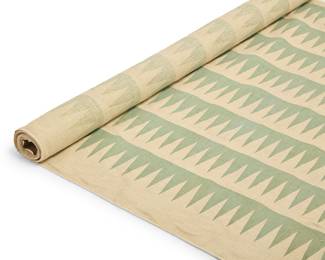 2241 Alexander Girard (1907-1993) A rolled length of 'Palio' furnishing fabric for Herman Miller Designed 1964 Screen print in green on linen, featuring zigzag banding With factory marks printed to selvage edges: S -1695 / "Palio" / Designed by Alexander Girard / Copyright 1964 / Herman Miller Inc. / [logo] Width 52 in., overall length 10 yds approximately; rolled diameter 3 3/4 in. approximately Estimate: $700 - $900