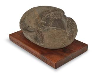 2097 James W. Washington Jr. (1909-2000) "Recycle of Life to Raven Form," 1974 Stone carving on an artist's wood base Carved with initials and date on the underside: JWW / 1974; impressed with initials, twice dated, and titled to artist's base Height overall 6 7/8 in., width 13 3/8 in., depth 7 1/2 in. Estimate: $8,000 - $12,000