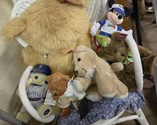 White Wicker Chair and Stuffed Animals