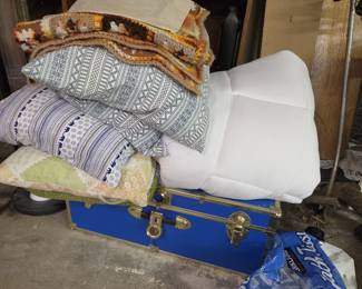 Crocheted Blankets and Blue Chest