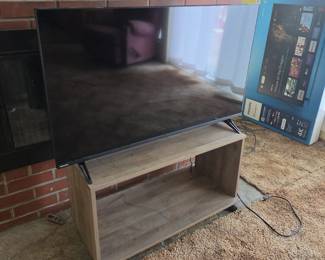 Flatscreen TV and Stand