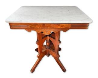 Victorian EastlakeStyle Marble Top Parlor Table w Carved Wooden Base