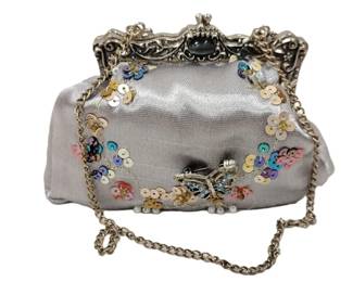 PUTTING ON THE RITZ MINI JEWELED AND SEQUINED HANDBAG