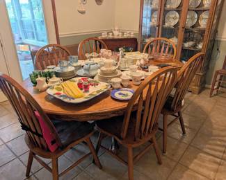 Solid oak dining table and six chairs