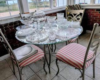 Glass top table and four chairs