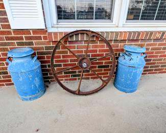 Vintage milk cans and wheel