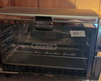 #79 Nesco rotisserie oven broiler/grill (looks unused) $100.00