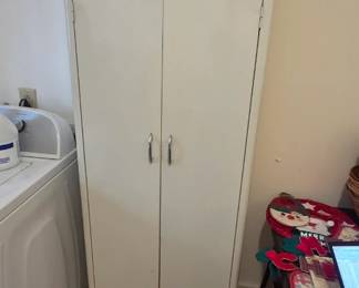 #85 Metal cabinet 5 shelves 24x12x64 $20.00