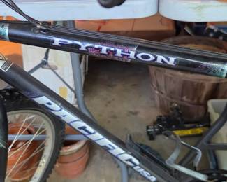 #107 Pacific cycle black mountain bike with newer seat $55.00