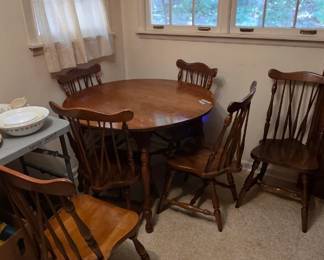 #20 Wood kitchen table with 6 chairs (as-is finish issues) 42 round (pair 10" leafs) 30" high $110.00