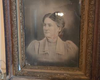 #148 Large wood framed portrait of a woman (as-is some frame damage) $25.00