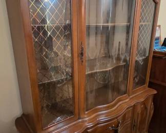 #17 Lenior House China cabinet with curved glass 2 shelves 3 drawers 2 doors 54x16x72 (heavy does look like 2 pieces) $125.00