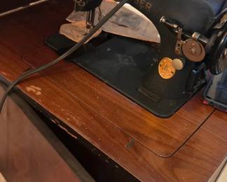 #42 Sears sewing machine and cabinet tested $55.00