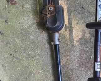 #112 Troy Bilt curved shaft gas trimmer TB 22EC with 10" chainsaw attachment $80.00