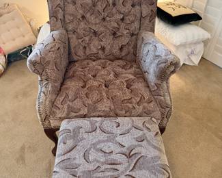 Upholstered wing back chair with matching foot stool