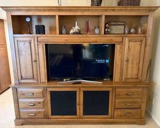 Outstanding Stone Creek entertainment cabinet with tons of storage for CD’s, DVD’s, albums and more