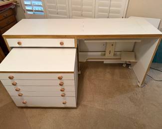 Sewing/crafting table with chest of drawers pulled out
