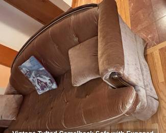 Vintage Tufted Camelback Sofa with Exposed Wood Trim second image