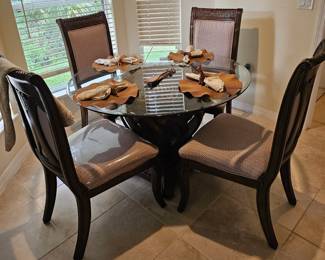 Sunflower Dining Table with Glass Top and Four Chairs FortySeven Inches in Diameter