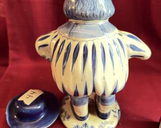 Ceramics including a Hanley Staffordshire England pitcher with equestrian scene, English Staffordshire transferware dishes, a DeMark 1962 Stork disk, a small mug inscribed 'Jane Hardgrave 1972,' and a figural Dutch-style Toby jug marked 'PNE 1682.'