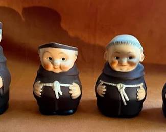 Goebel friar monk containers from Western Germany. Includes two handled jugs and two lidded jars. Marked "Western Germany" with Goebel stamps and numbers to bases. Distinctive brown robes and rope details.