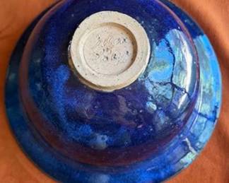 Blue decorated and glazed stoneware pottery, including signed pieces by David Eldreth of Nottingham, PA, bowls, crocks, a pitcher, decorated heart and flower motifs, and a dog dish. Some pieces are dated 1993 and 1999.