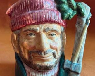 Royal Doulton ceramic character jugs including Bacchus, Granny, Drake, The Lumberjack, Long John Silver, and Captain Henry Morgan. Each jug features hand-painted details and Doulton backstamps.