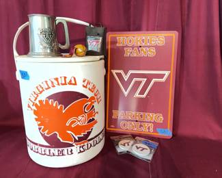 Virginia Tech Stubbler Kooler ice bucket, metal tankard with VT logo, parking sign, VT magentas, VT branded absorbent coasters, and a VT branded metal flask.