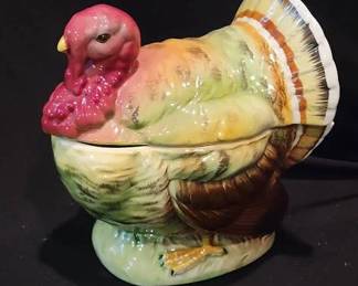 Lefton China turkey-shaped covered dish, model H1429. The ceramic piece features colorful hand-painted details and a removable lid. The underside retains the original Lefton foil label and the embossed model number.