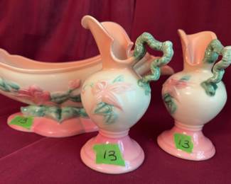 Hull Pottery console set featuring a W6-8 marked centerpiece bowl and two matching floral pitchers. Each piece displays a pink and green hand-painted floral motif. All bases are marked "Hull W6-8" with original signatures.