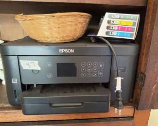 Epson Expression Home XP-5100 inkjet printer with Wi-Fi connectivity and included power and USB cables. Bundle includes multiple Epson 202XL and 202 ink cartridges, both boxed and loose. 